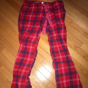 Redish pink pajama bottoms with blue stripes